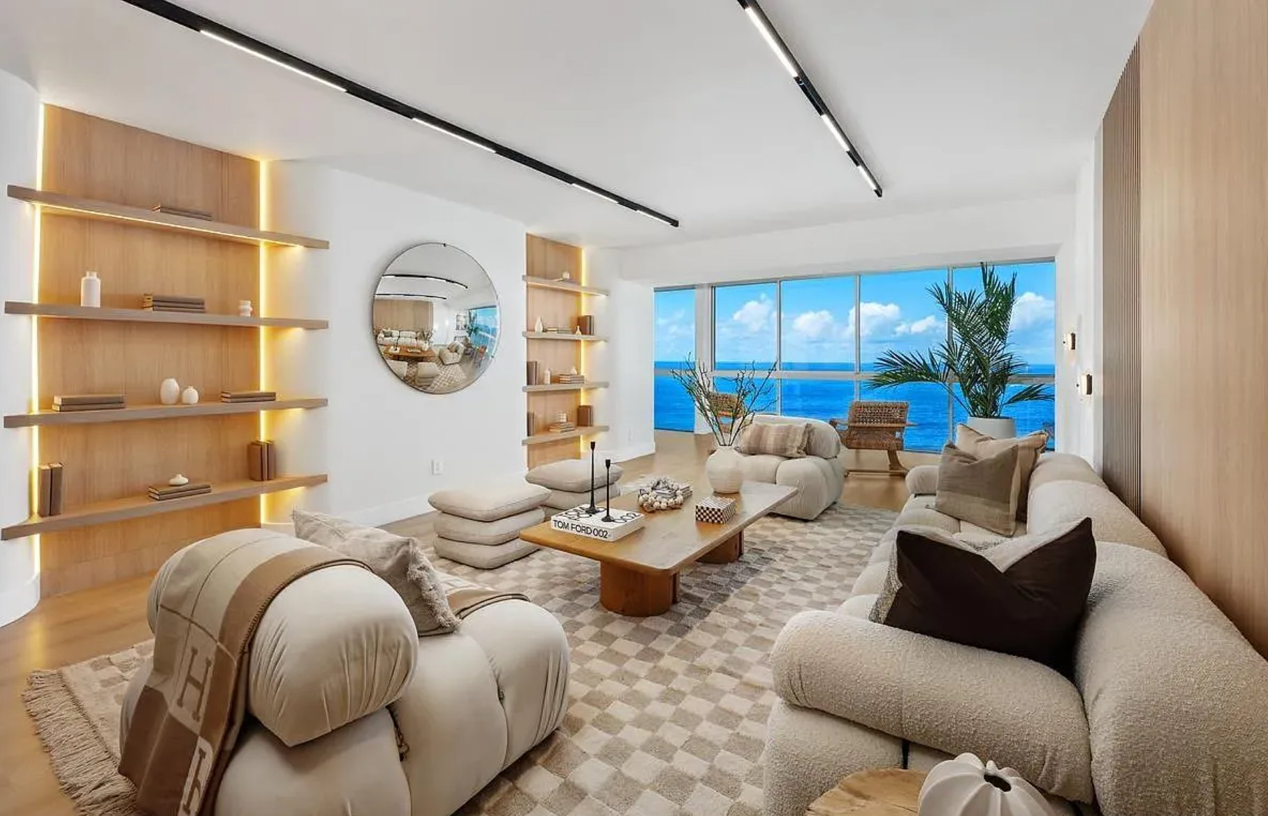 Edit House — ocean-view living room, staged